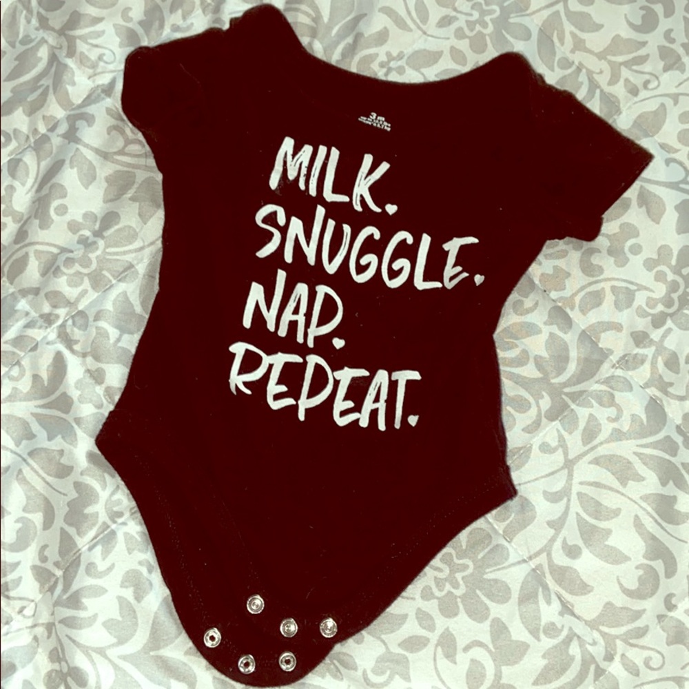 Black onesie boy or girls.